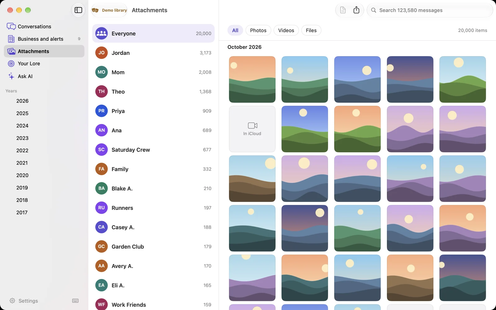 The Attachments page: 20,000 photos, videos and files, by person and by month.